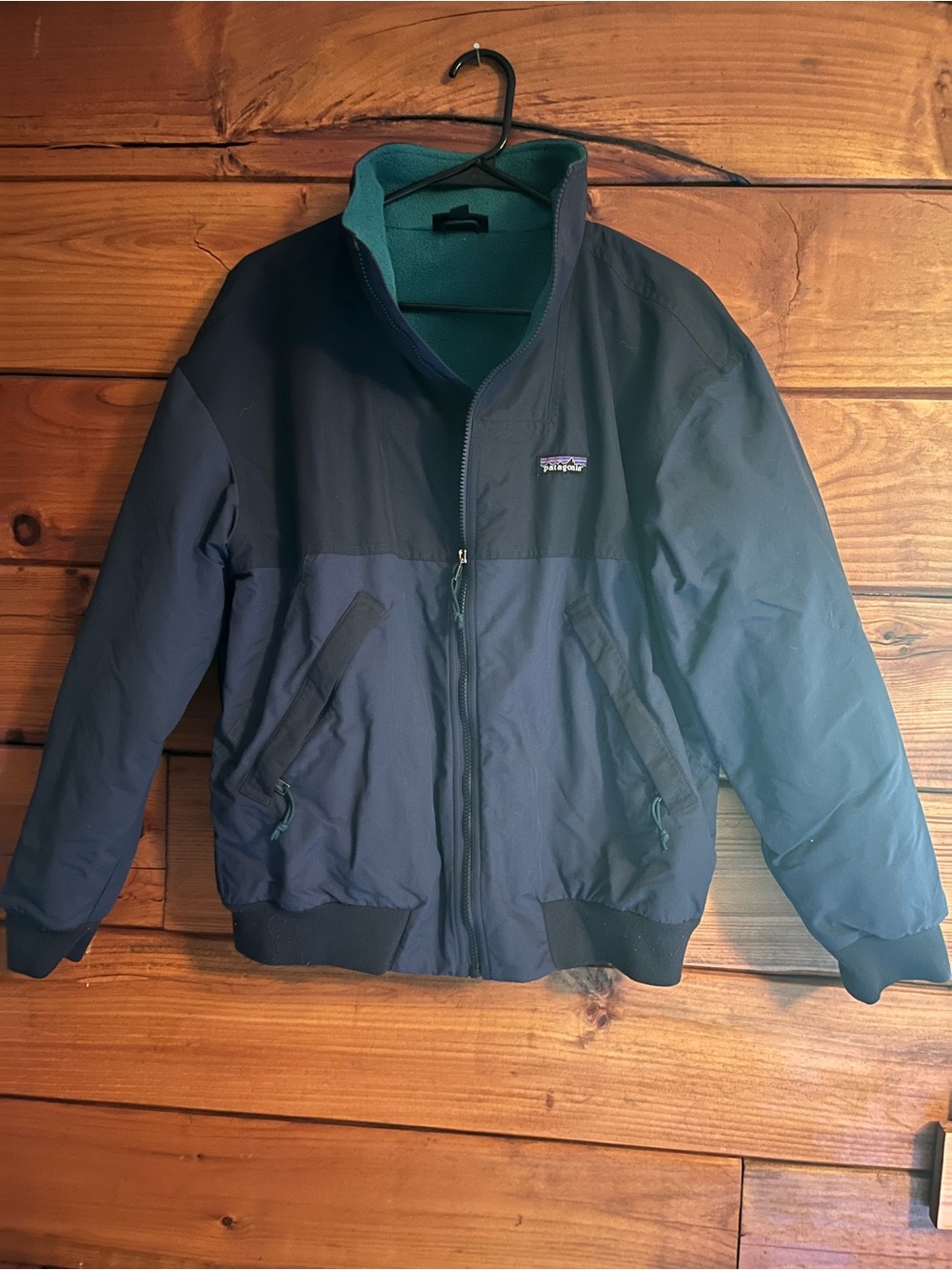 Patagonia Navy Bomber Jacket with Teal Fleece Lining